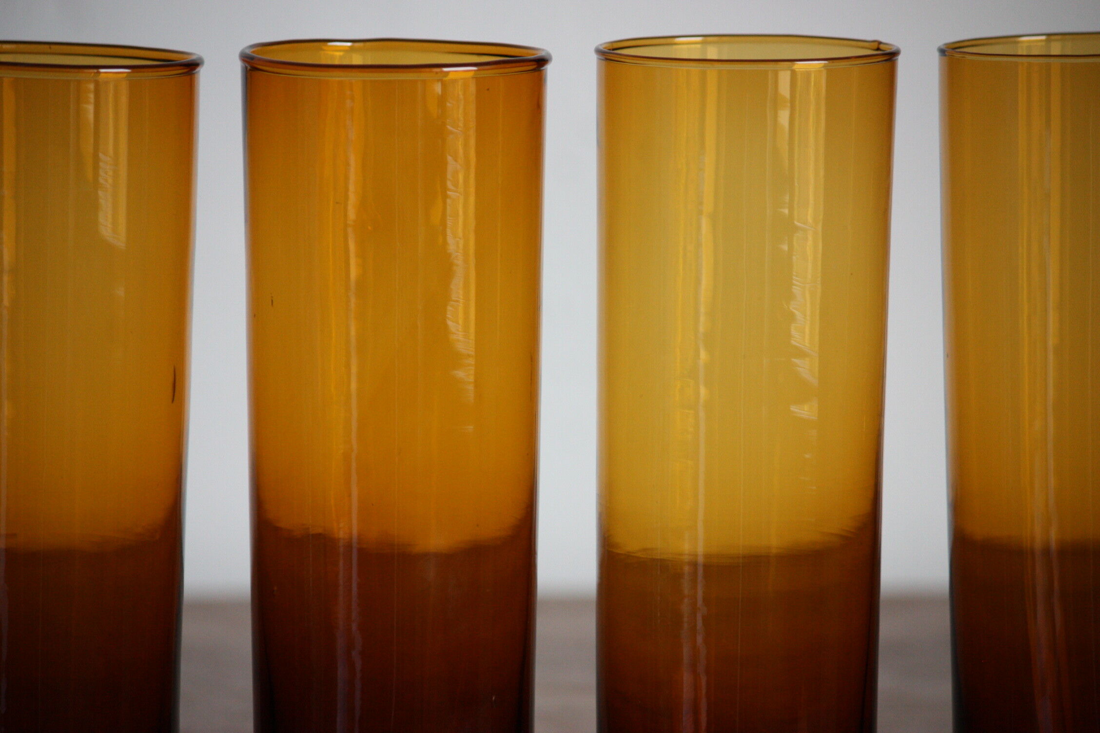 4 amber glasses with orangeade