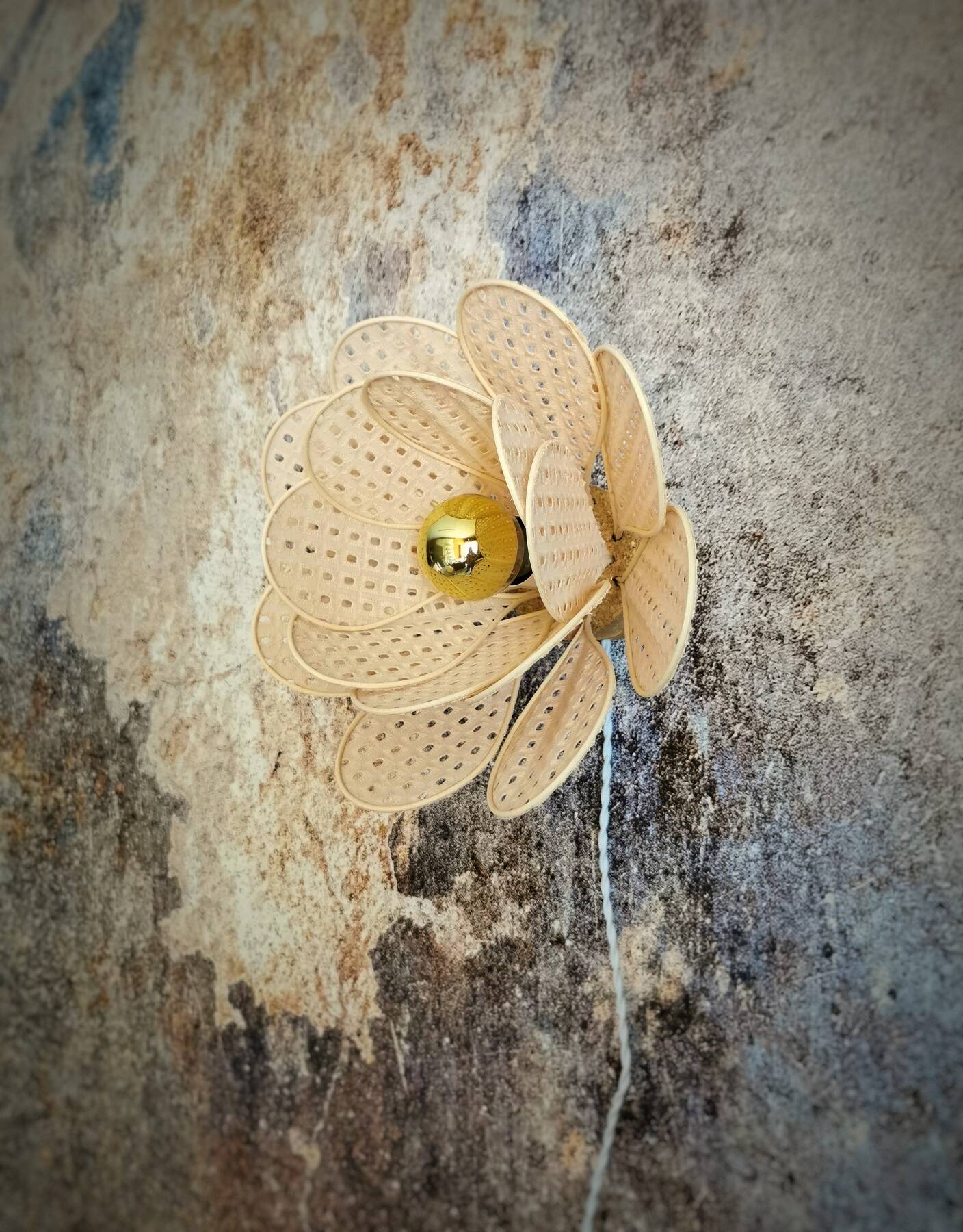 Flower wall light made of rattan petals and nude embroidery