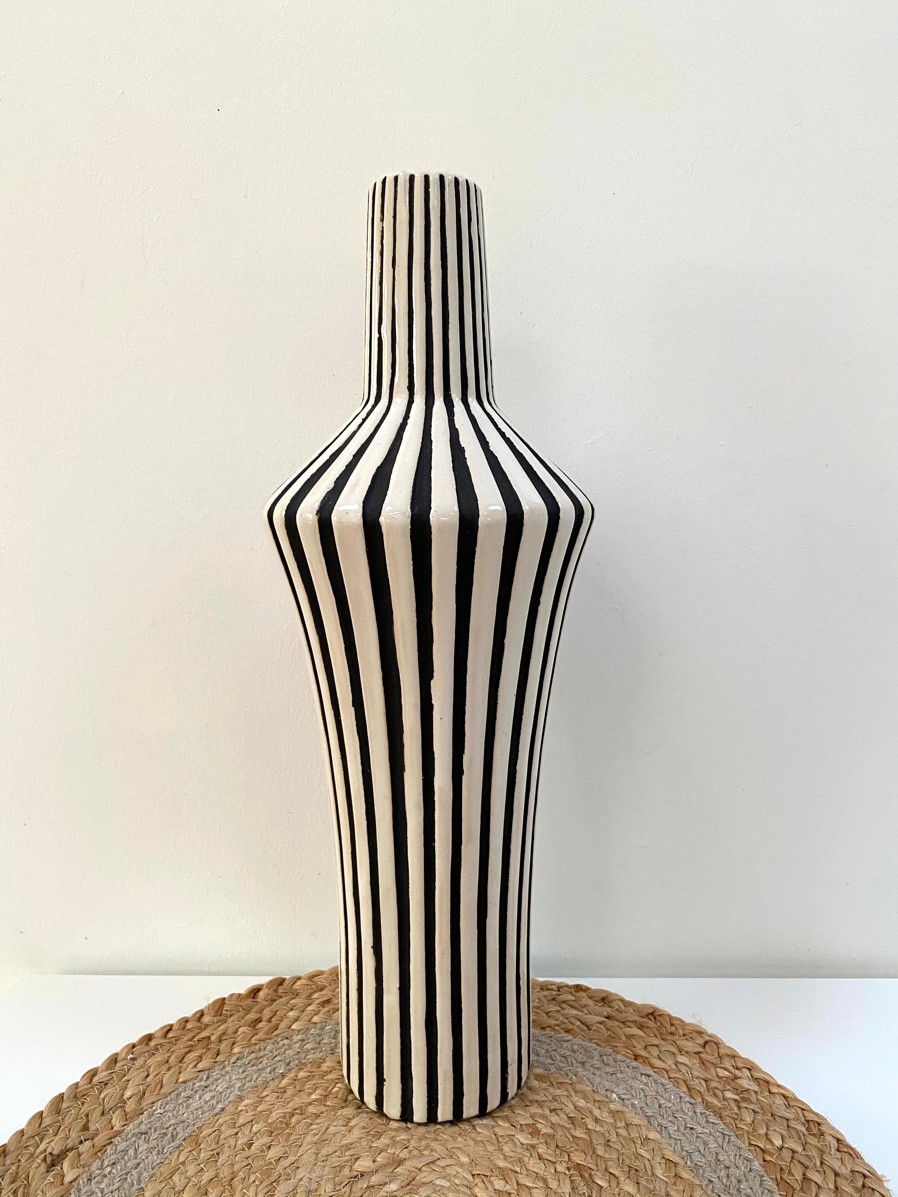 Graphic ceramic vase with black and white stripes