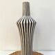 Graphic ceramic vase with black and white stripes