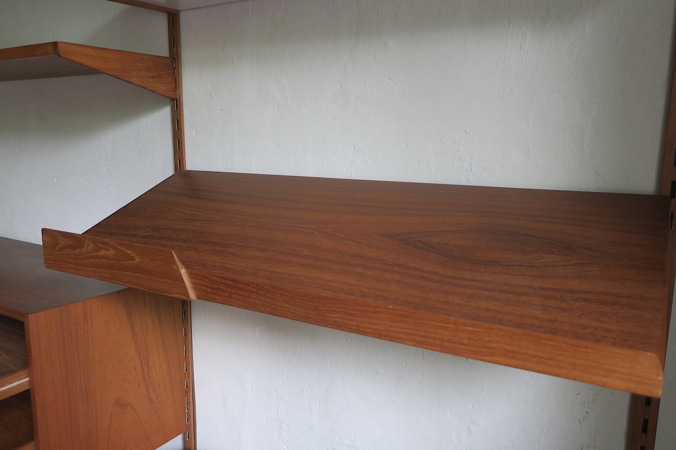 Modular 3-compartment teak wall shelving system with desk and lighting by Kai Kristiansen for FM, Denmark, 1960s