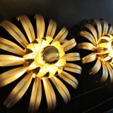 Golden metal flower sconces
