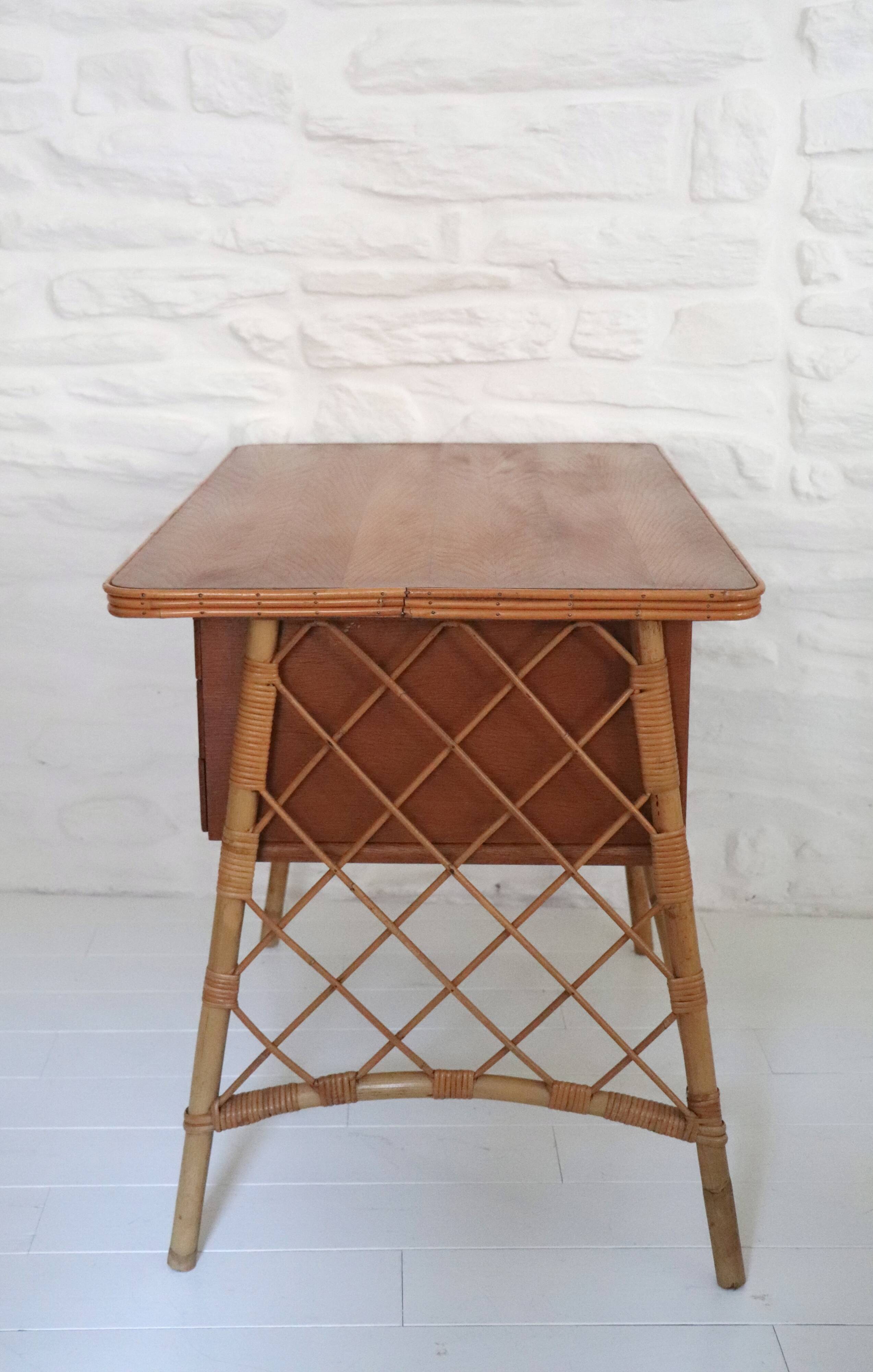 Desk and chair in rattan, Louis Sognot, 1950s-1960s.