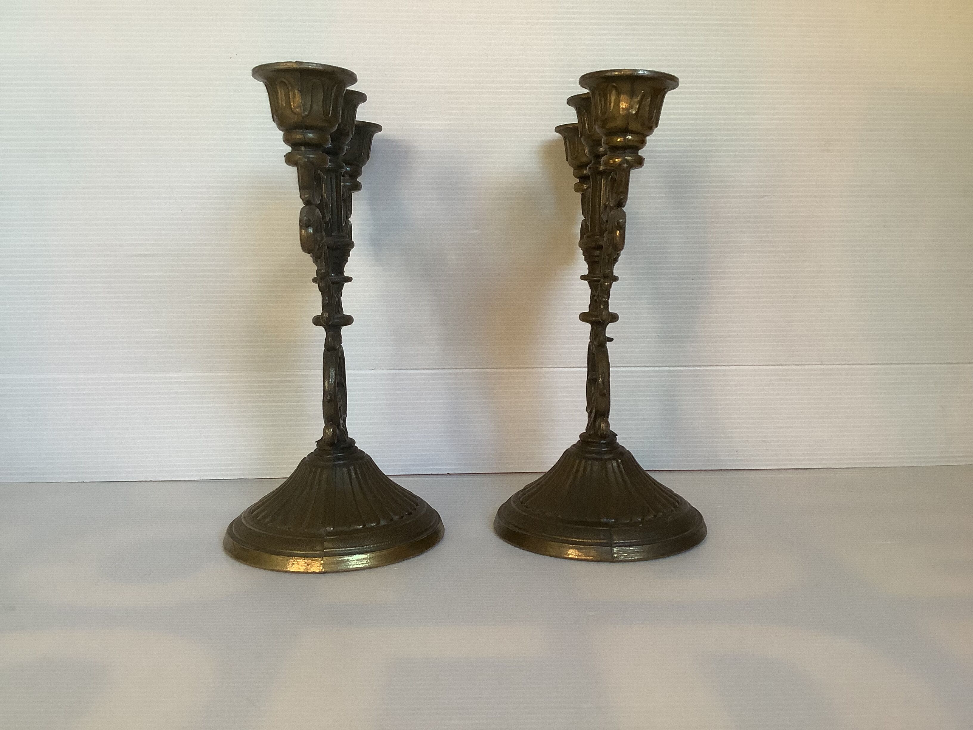 Pair of baroque brass candle holders