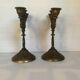 Pair of baroque brass candle holders
