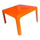 Small orange fiberglass side table from the 70s