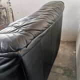 Pair of black leather armchairs from the 80s