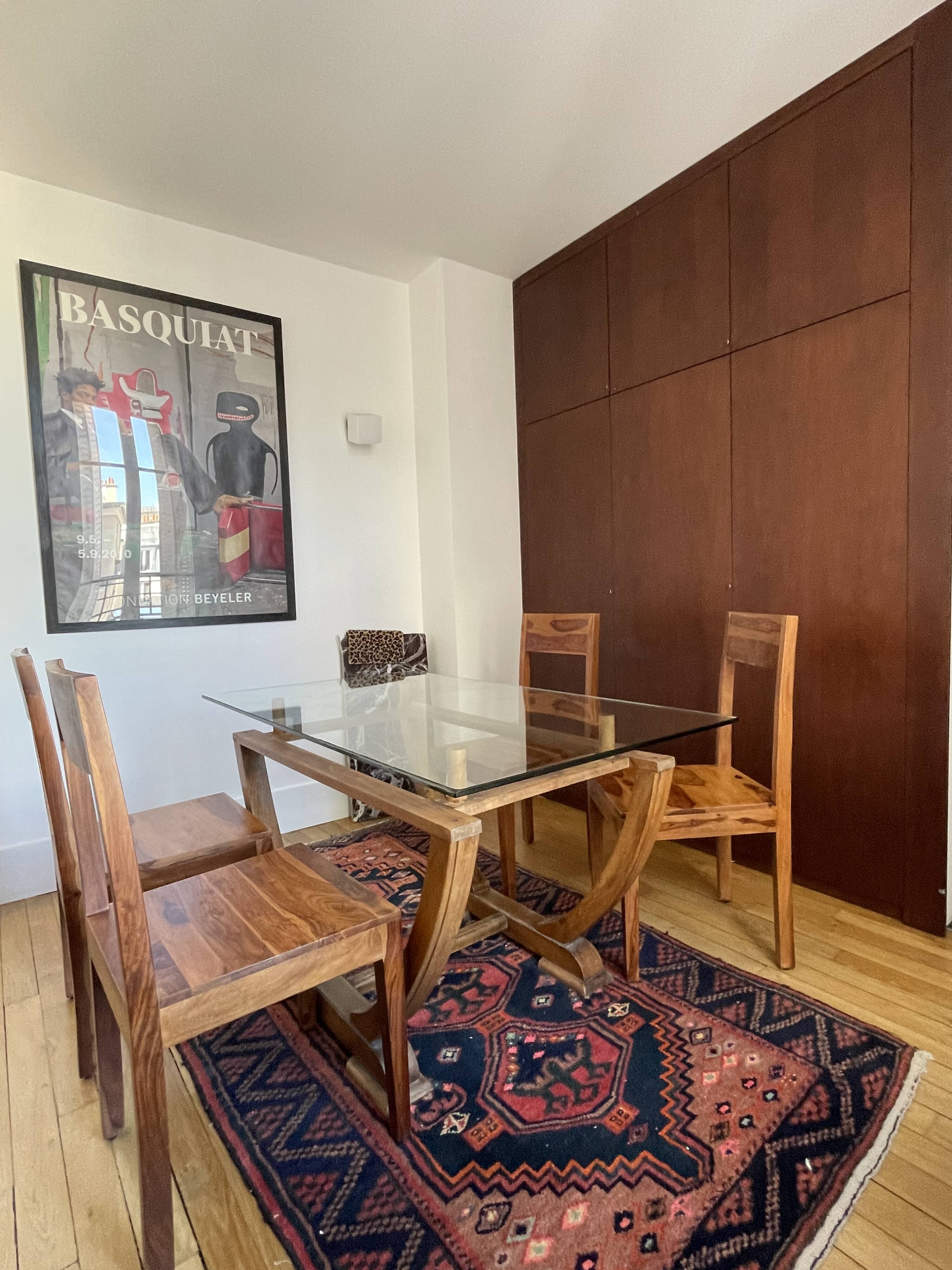 Dining table set with 4 solid wood chairs.