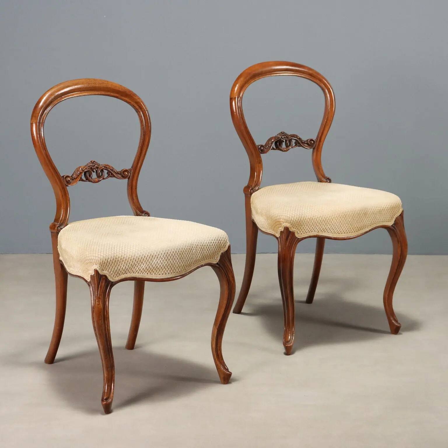 Antique walnut chairs with upholstered seats, Italy, mid-19th century.