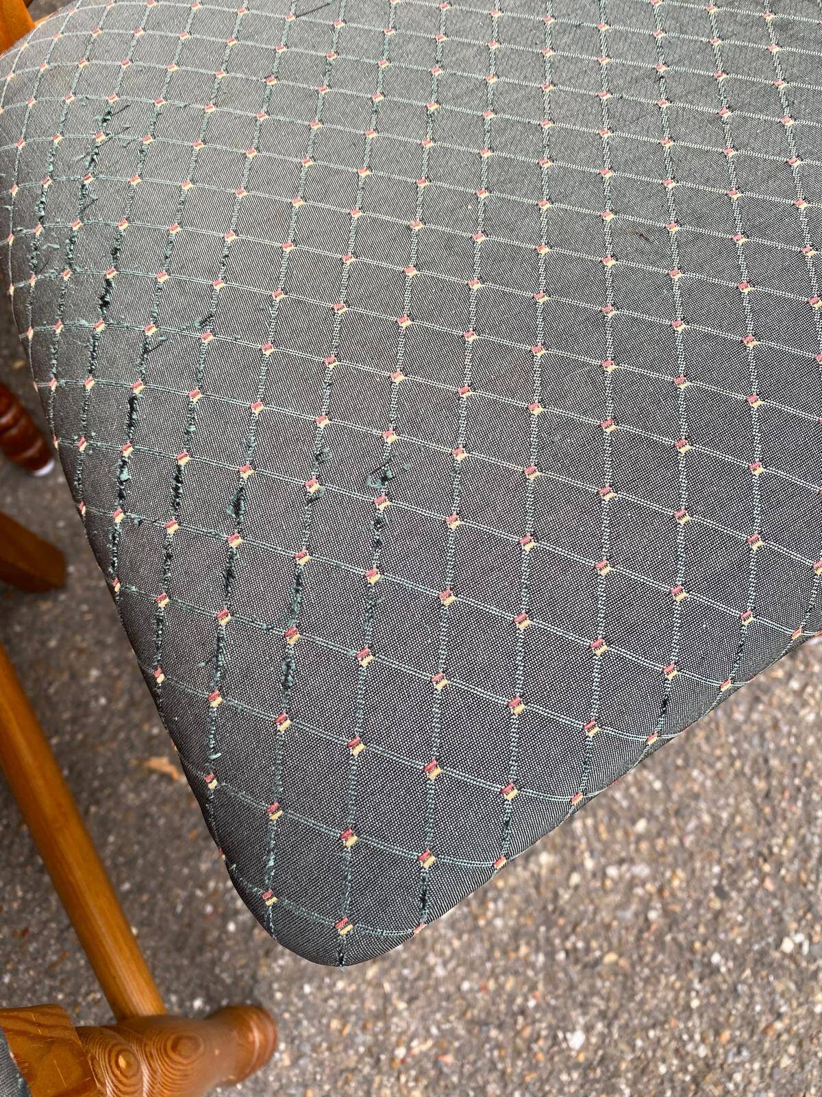 4 Landes chairs with solid wood frames and grey fabric.