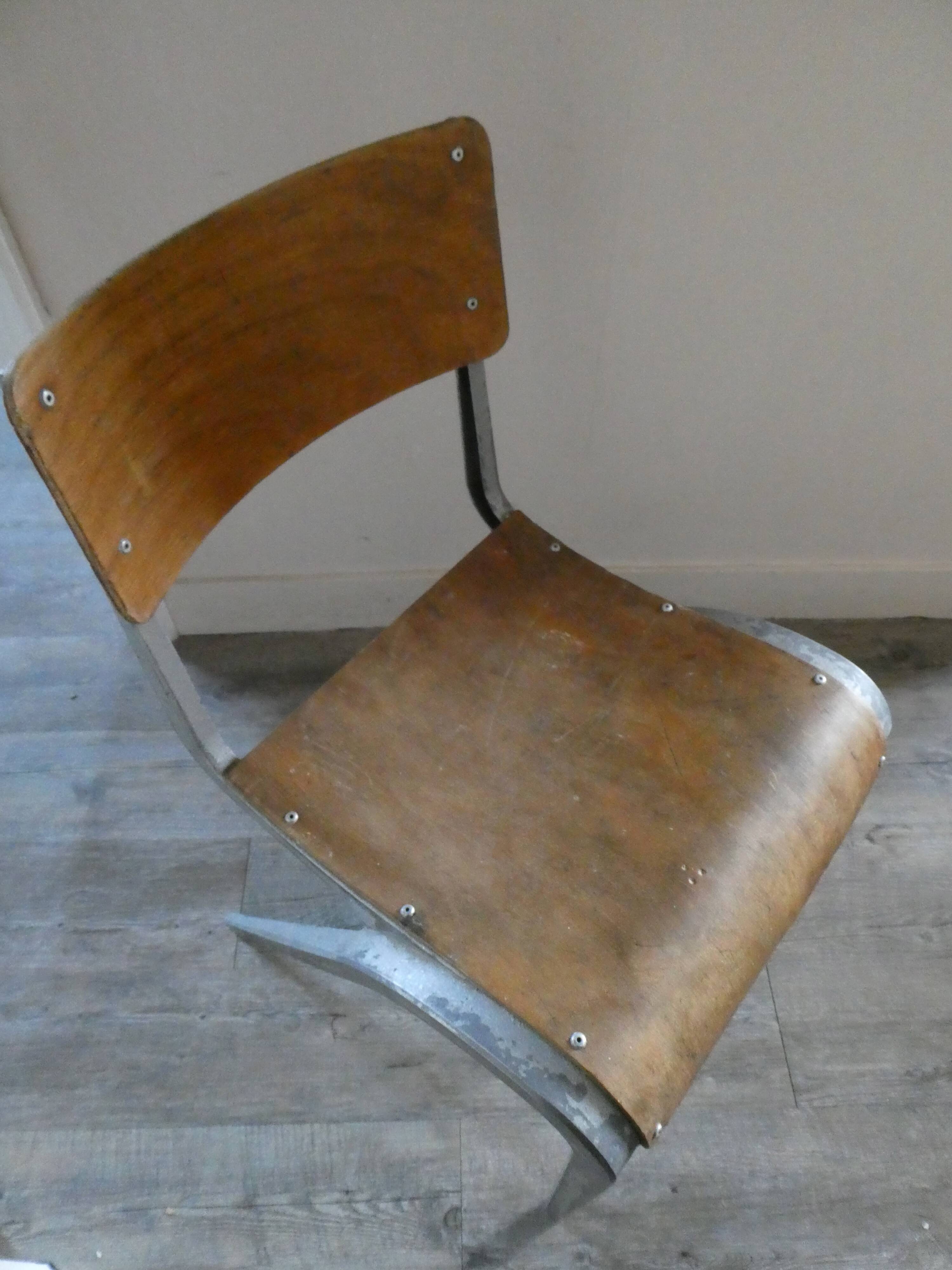 Chair in metal and wood of James Léonard 50 years