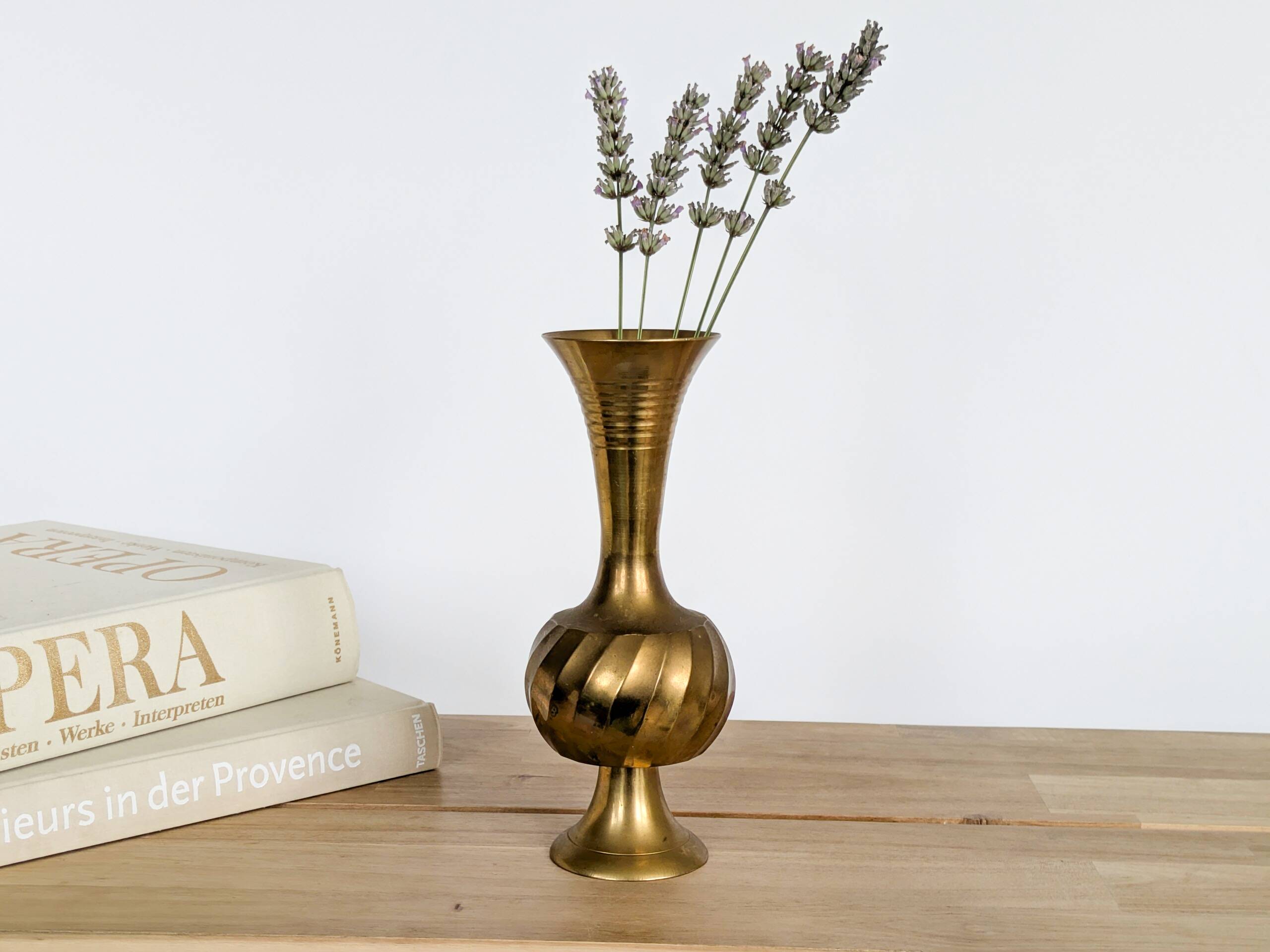 Solid brass Midcentury vase in trumpet shape with twisted details.