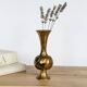 Solid brass Midcentury vase in trumpet shape with twisted details.