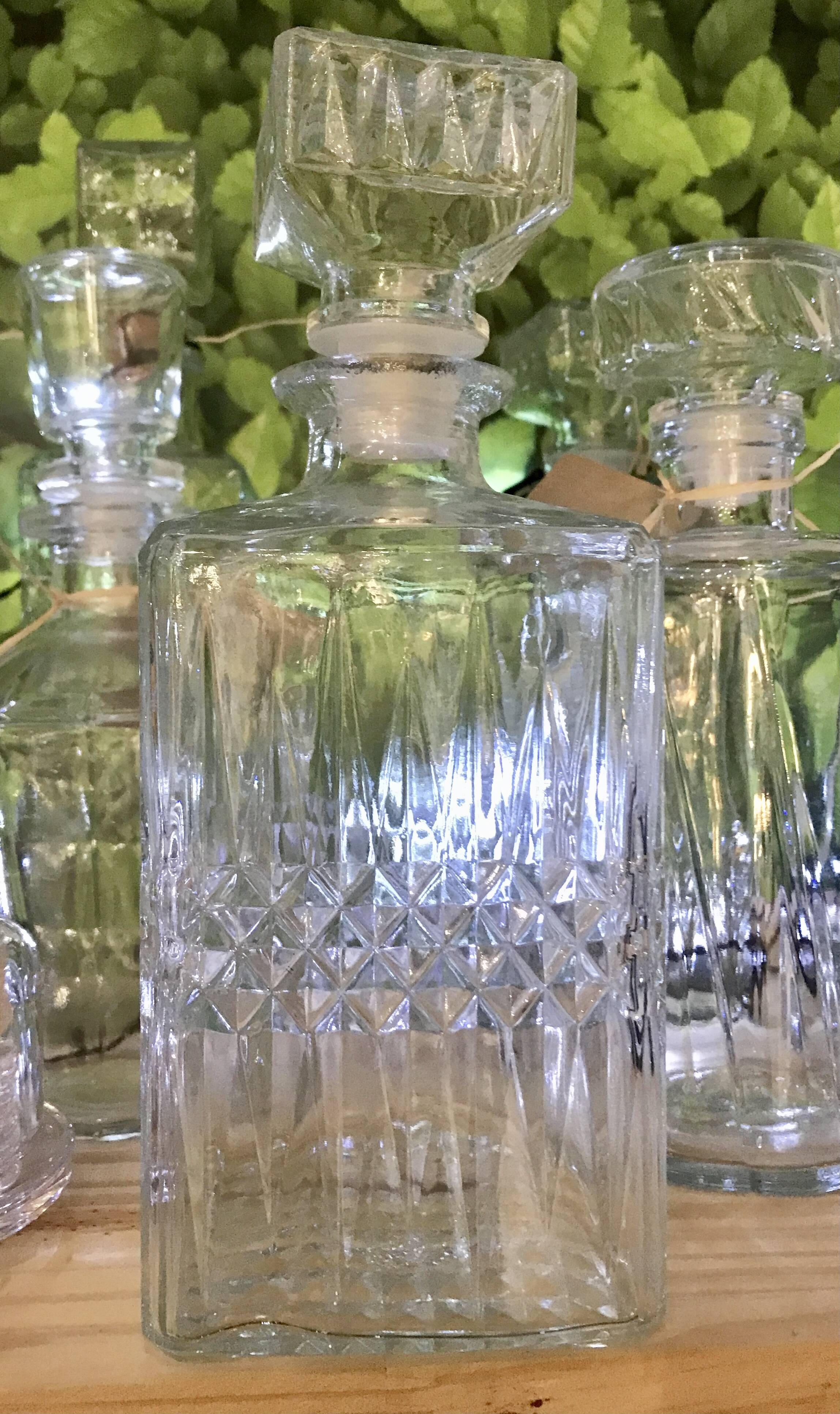 Vintage embossed glass whiskey decanter