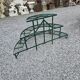 Old half-moon wrought iron plant holder