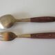 Vintage teak and brass housewife, dessert spoons and forks