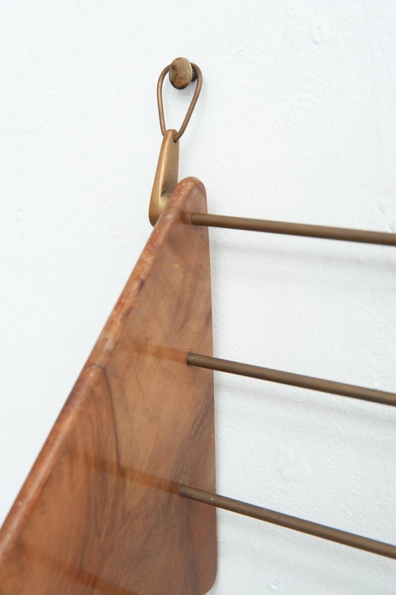 Wall-mounted walnut bookshelf by Carl Auböck, 1950s