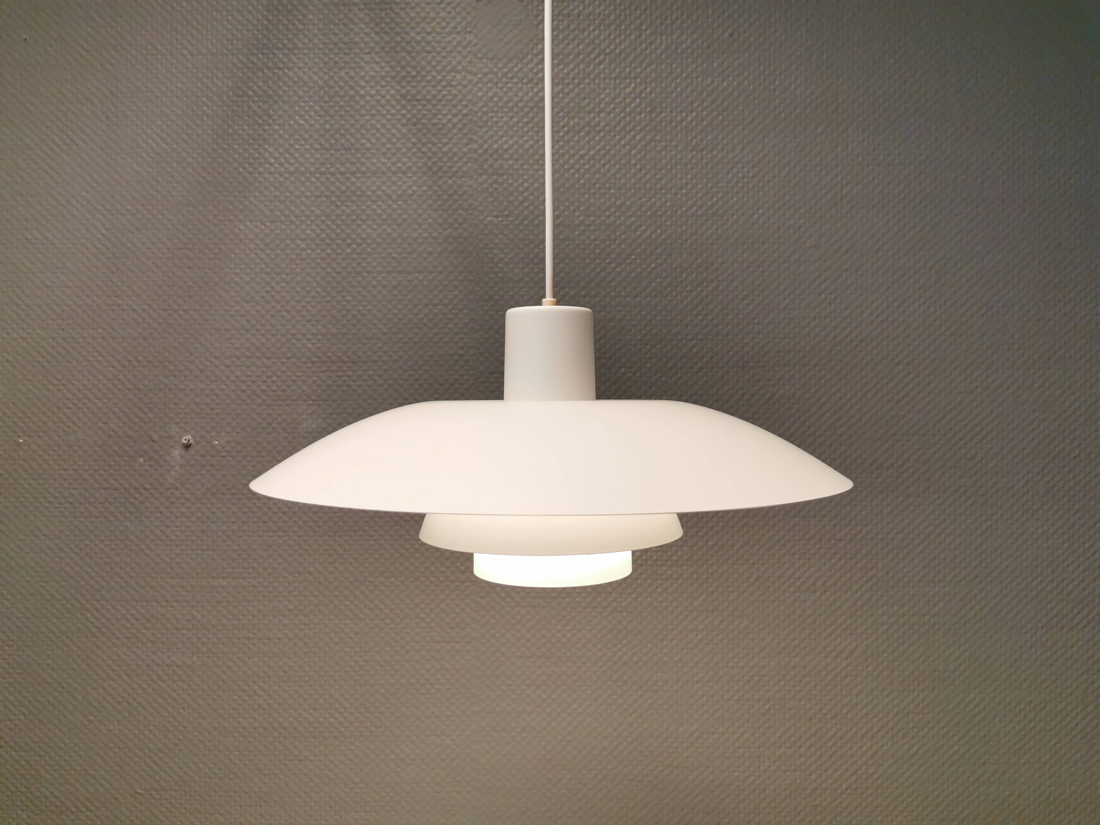 Beautiful older PH 4/3 hanging lamp, in white, with original orange suspension.