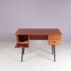 1950s small teak desk on black wooden legs Netherlands