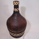 Bouteille ancienne en cuir