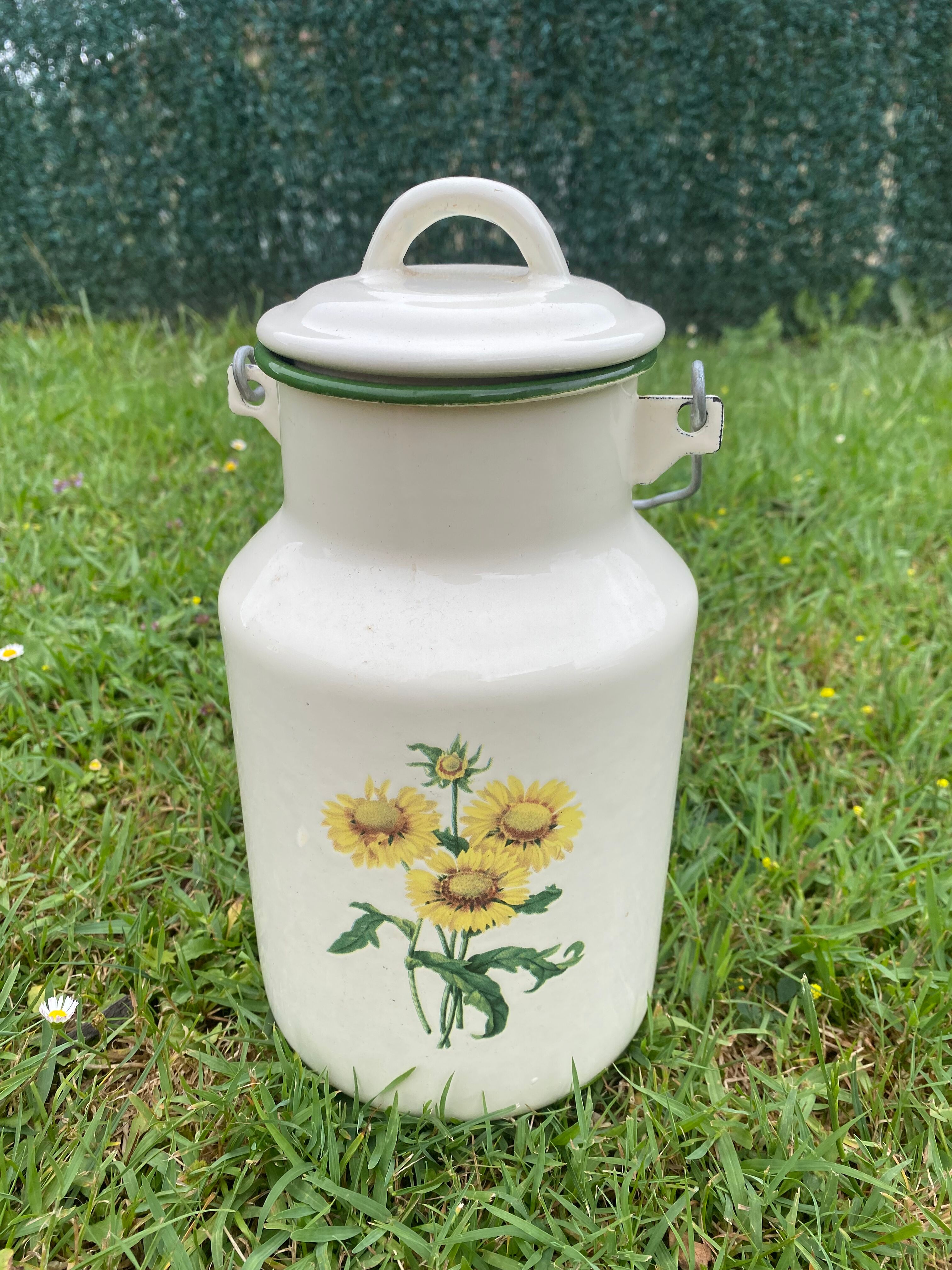 Enamelled old milk pot