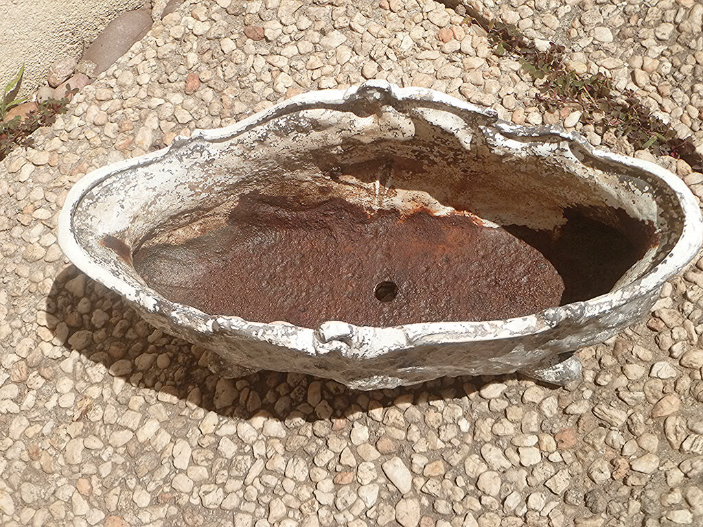 old cast iron planter