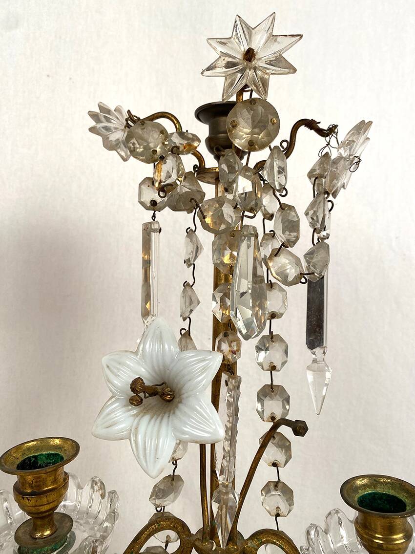 Pair of candlesticks with tassels and flowers in white porcelain