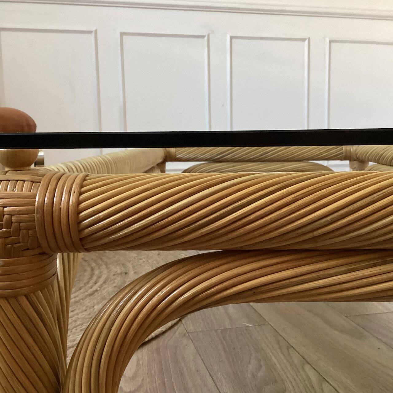 Large rattan and glass coffee table