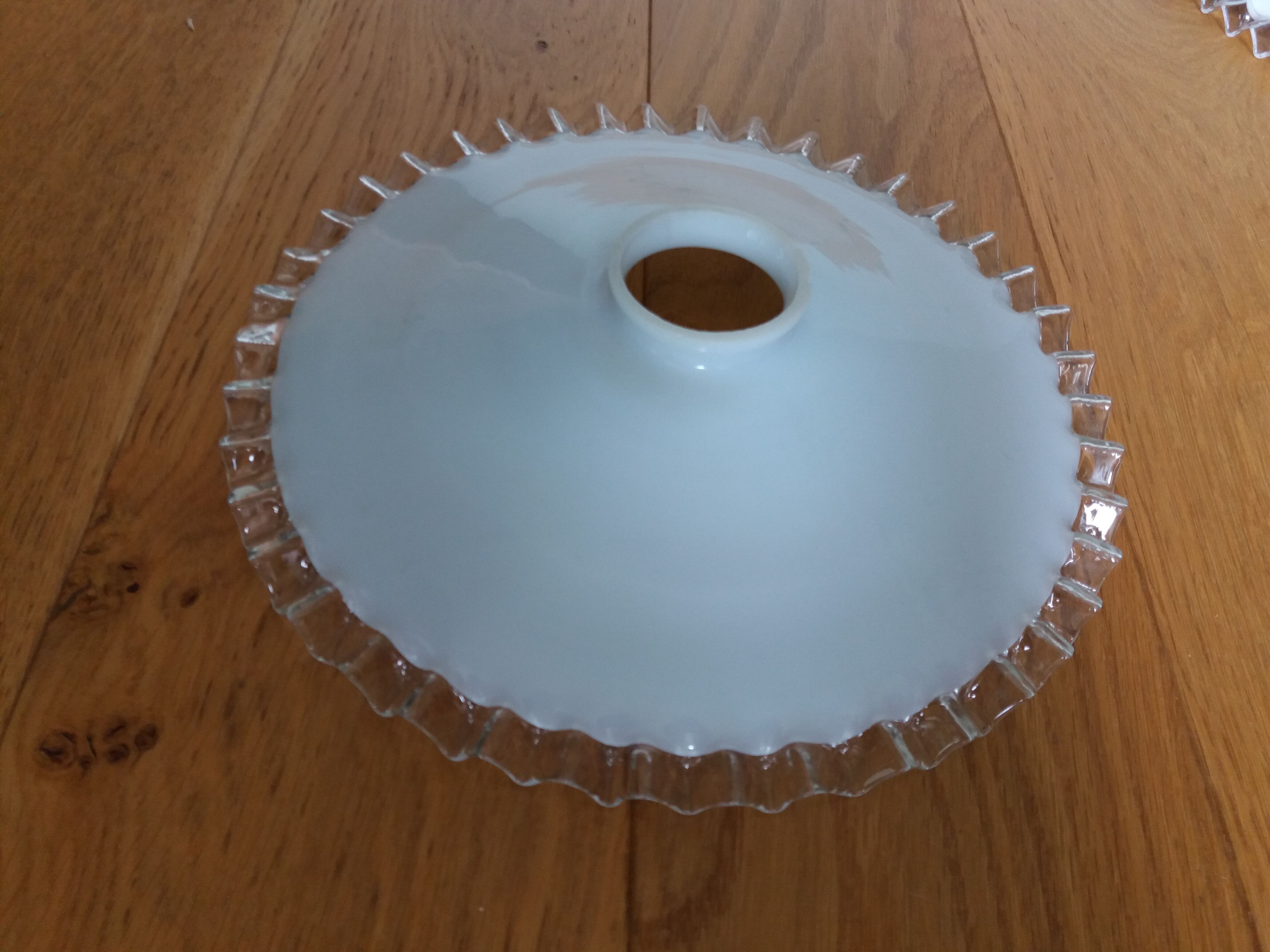 White opaline daylight and transparent wavy edge