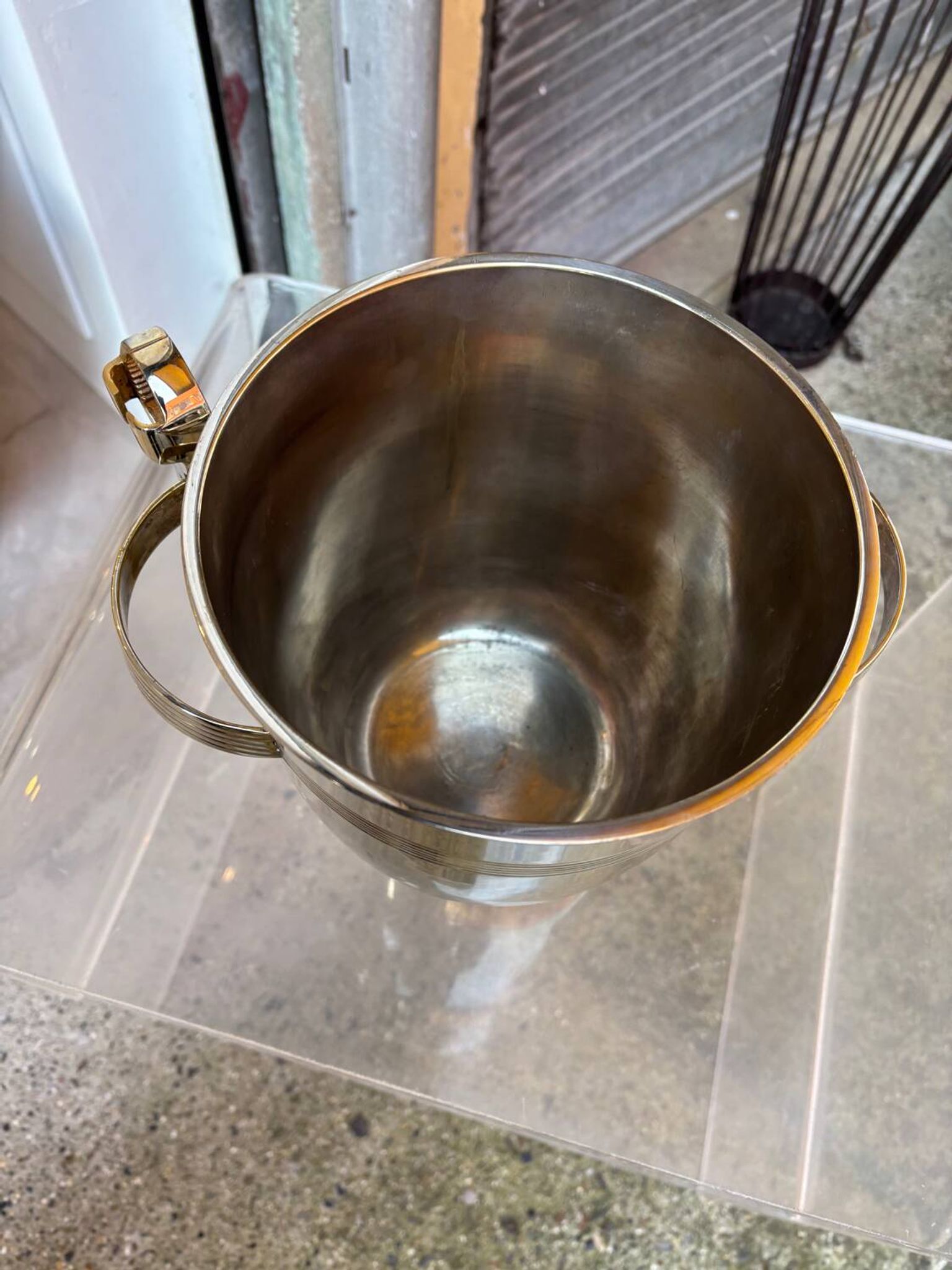 Alpaca champagne bucket from the 1920s with its monopole tongs.