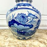 Chinese vase in blue-white porcelain decorated with lotus flowers