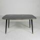Vintage coffee table with glass top and angled legs