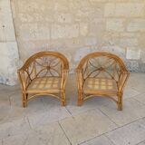 Two large rattan armchairs