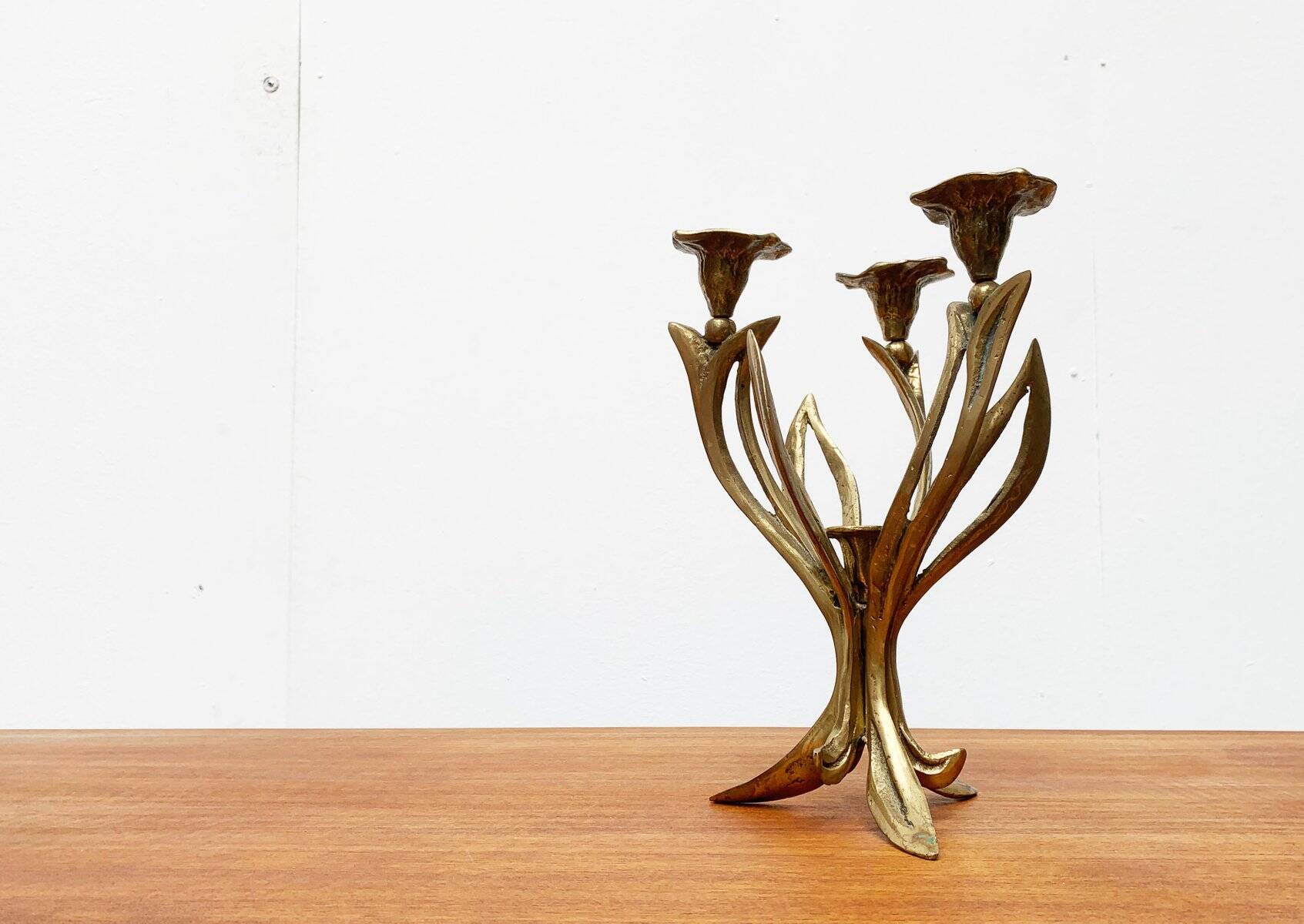 Vintage brutalist floral metal candlestick