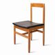 Oak chair with a black leather seat made in the 1960s