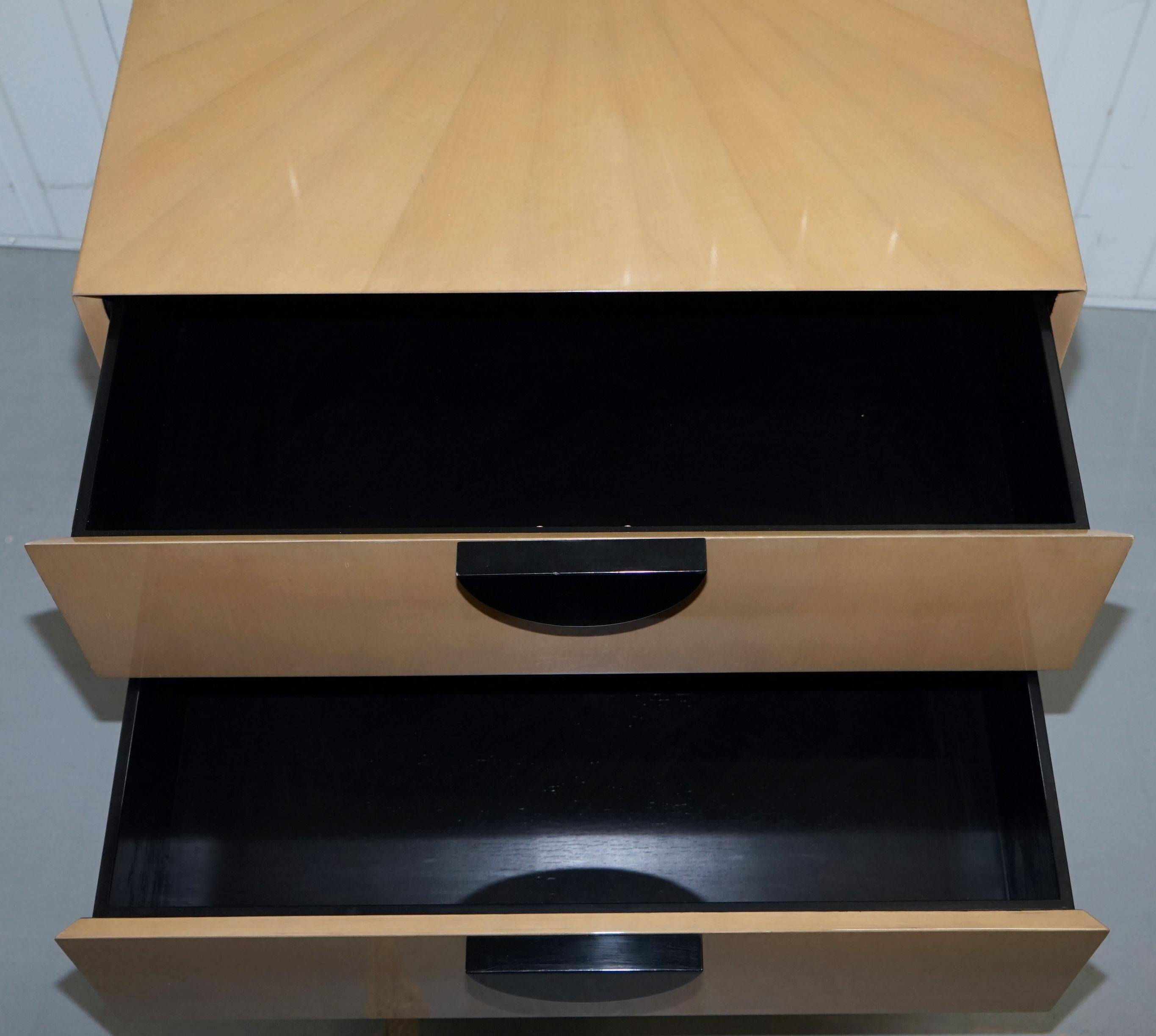 Cloud bedside tables by J Robert Scott with 14-carat gold veneer.