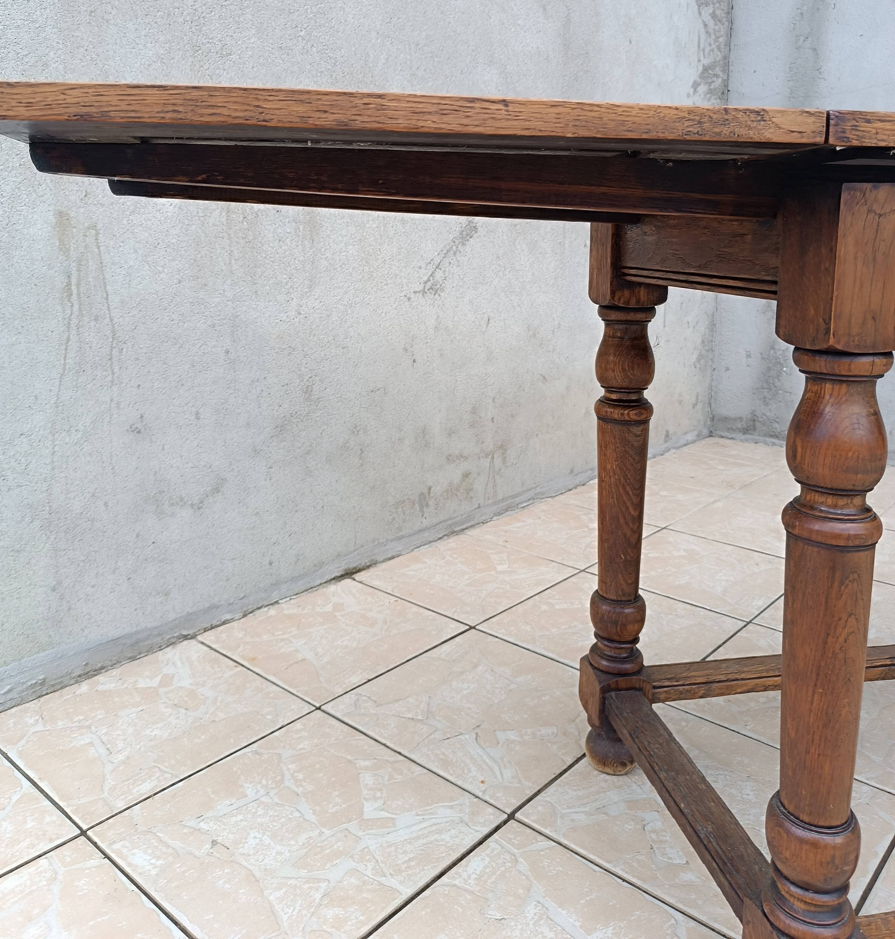Table console rustique à rallonges en chêne début 20ème
