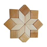 Under the geometric wooden plate