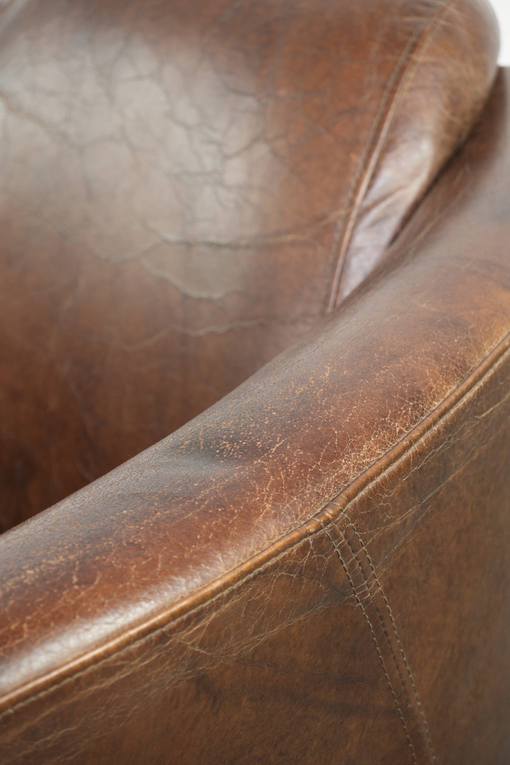 Sturdy dark cognac brown cow leather Aviator design armchair