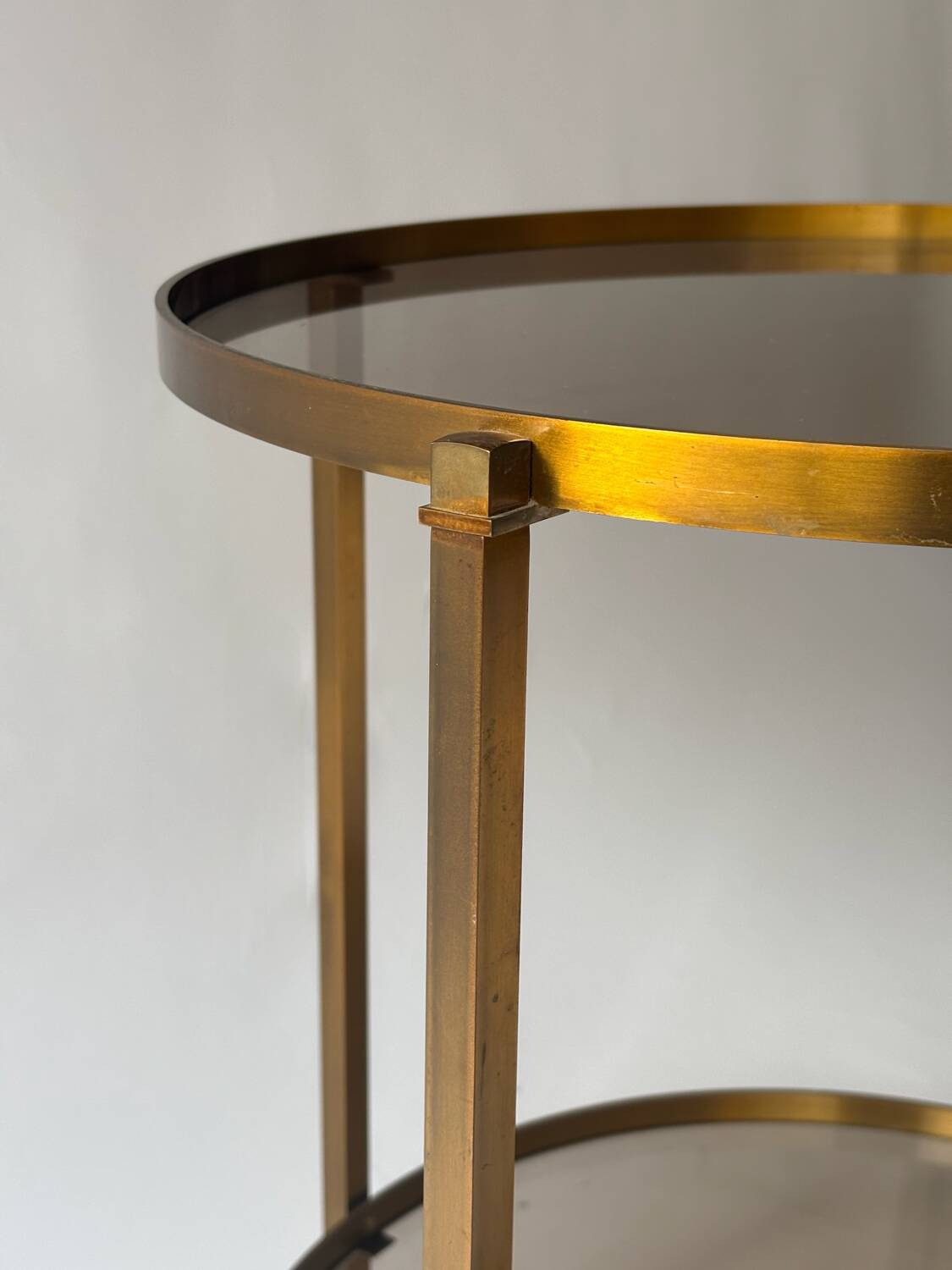 Rolling dessert trolley in brass and smoked glass, 1960