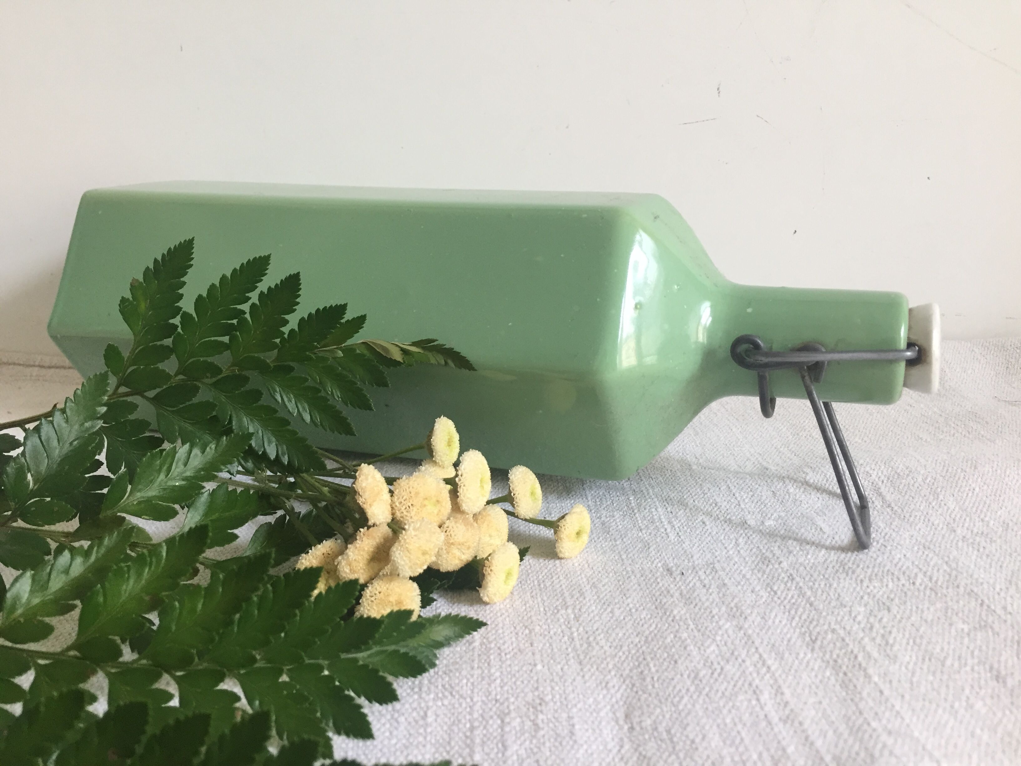 Green hexagonal sandstone bottle