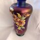 Iridescent glass vase with enamelled flowers, early 20th century