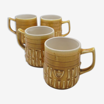 Series of 4 vintage mugs