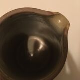 Small pitcher in patinated sandstone
