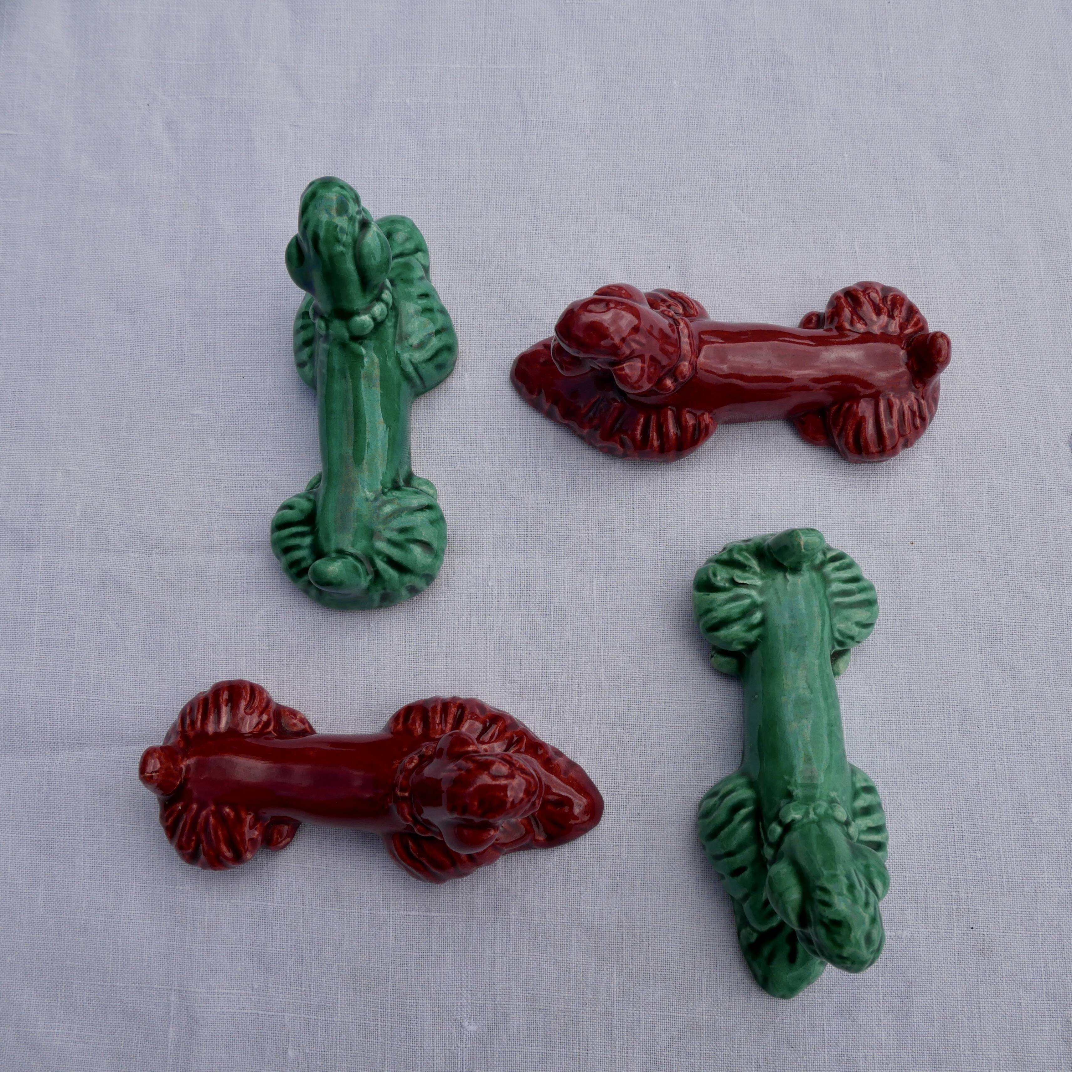 4 knife holders in the shape of poodles