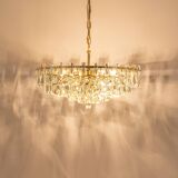 Large chandelier in gilded brass and crystal, by Palwa, Germany, 1970s.