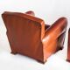 Pair of vintage club armchairs. Wood and Skay. France, 50