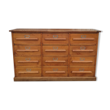Trade furniture with 12 drawers in gilded oak