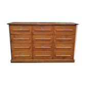 Trade furniture with 12 drawers in gilded oak