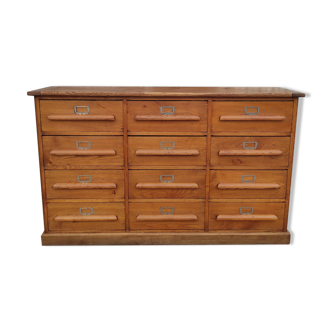 Trade furniture with 12 drawers in gilded oak